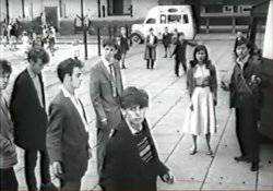 Scene in Gerard Gardens with Tsai Chin as 'Primrose' and Michael Chow as 'Alexander' [Rank Films]